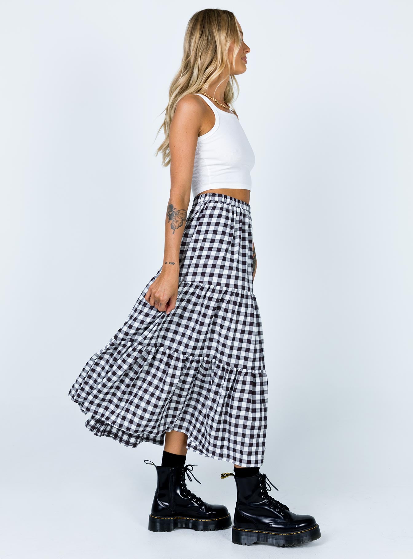   side view of model wearing Princess Polly Hale Midi Skirt Black / White 