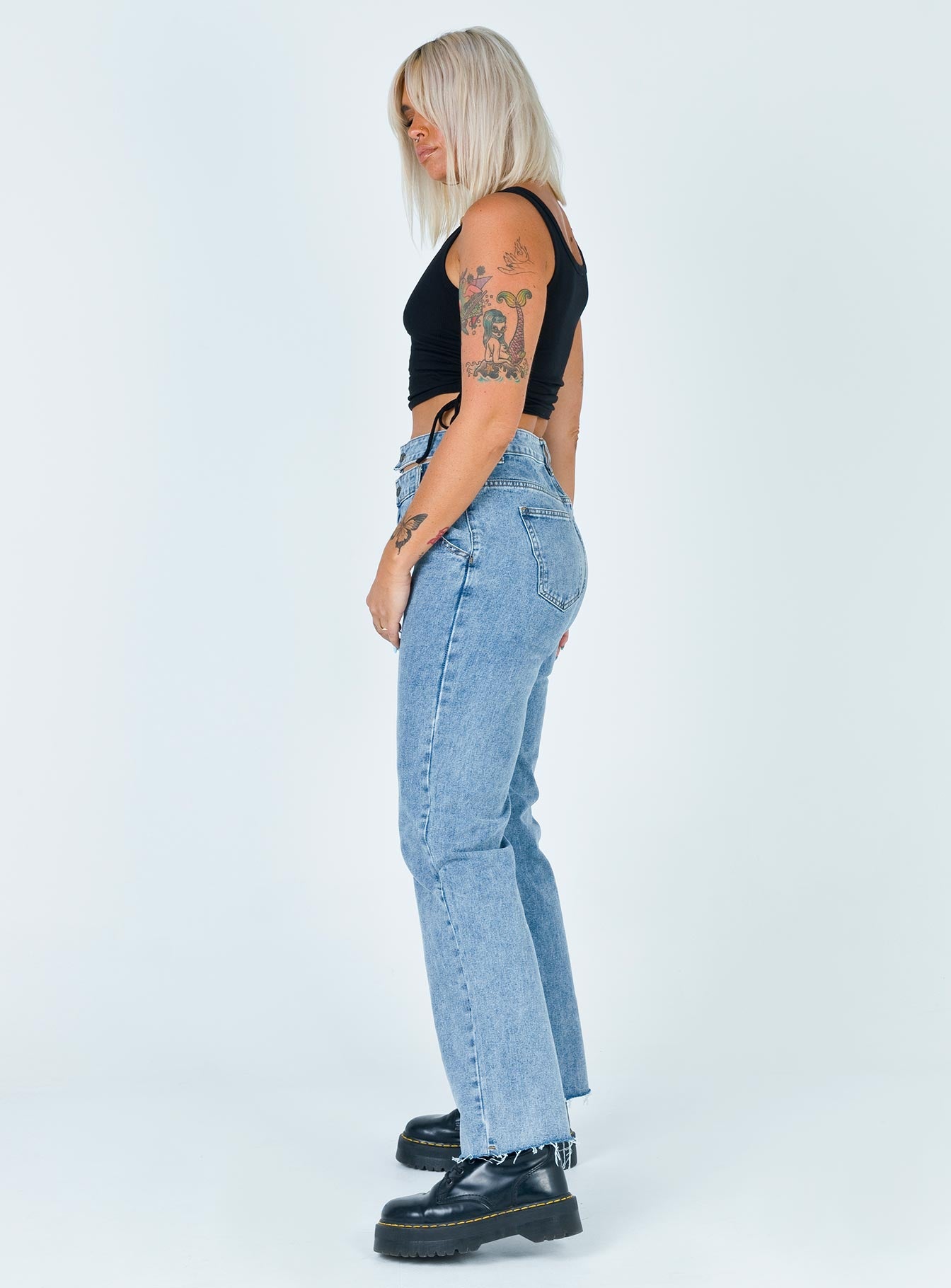 side view of model wearing Princess Polly Nothing But A Dream Denim Jeans Mid Rise 