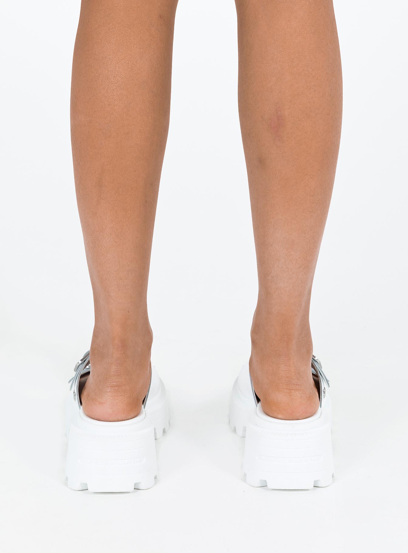 Sandals Faux leather material Platform base Square toe Double strap upper Silver toned buckles Padded footbed Treaded sole