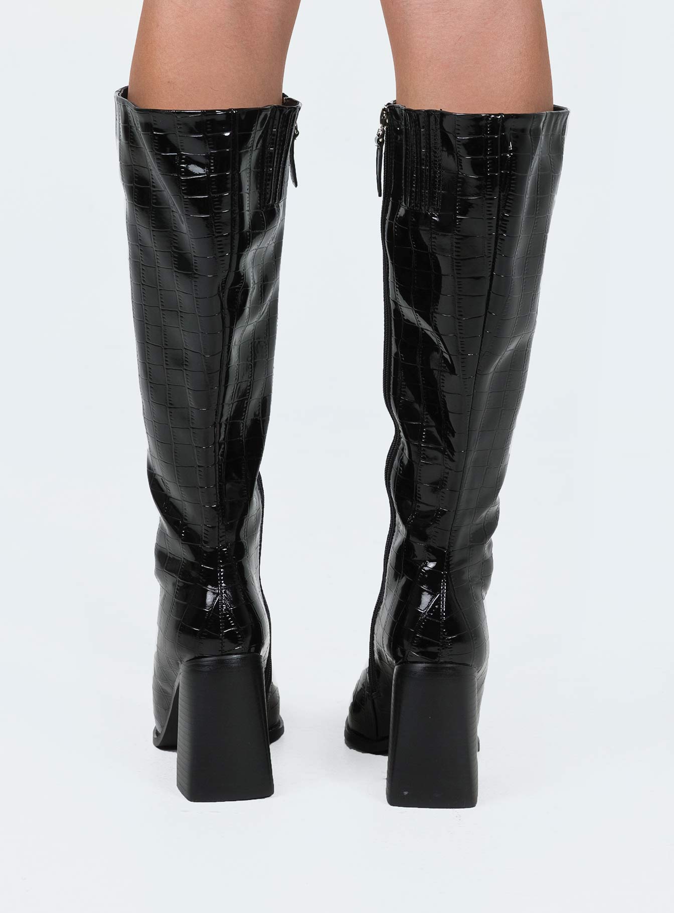 Knee high boots Faux leather material Croc print Squared toe Flared block heel Zip fastening at side