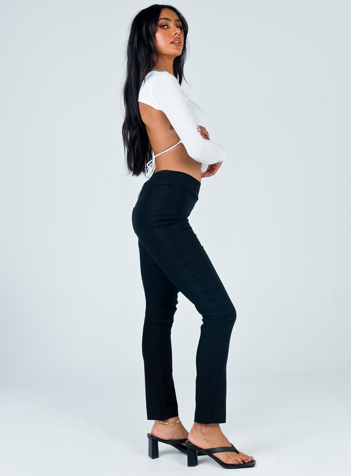 side view of model wearing Princess Polly Mikaela Pants Black 