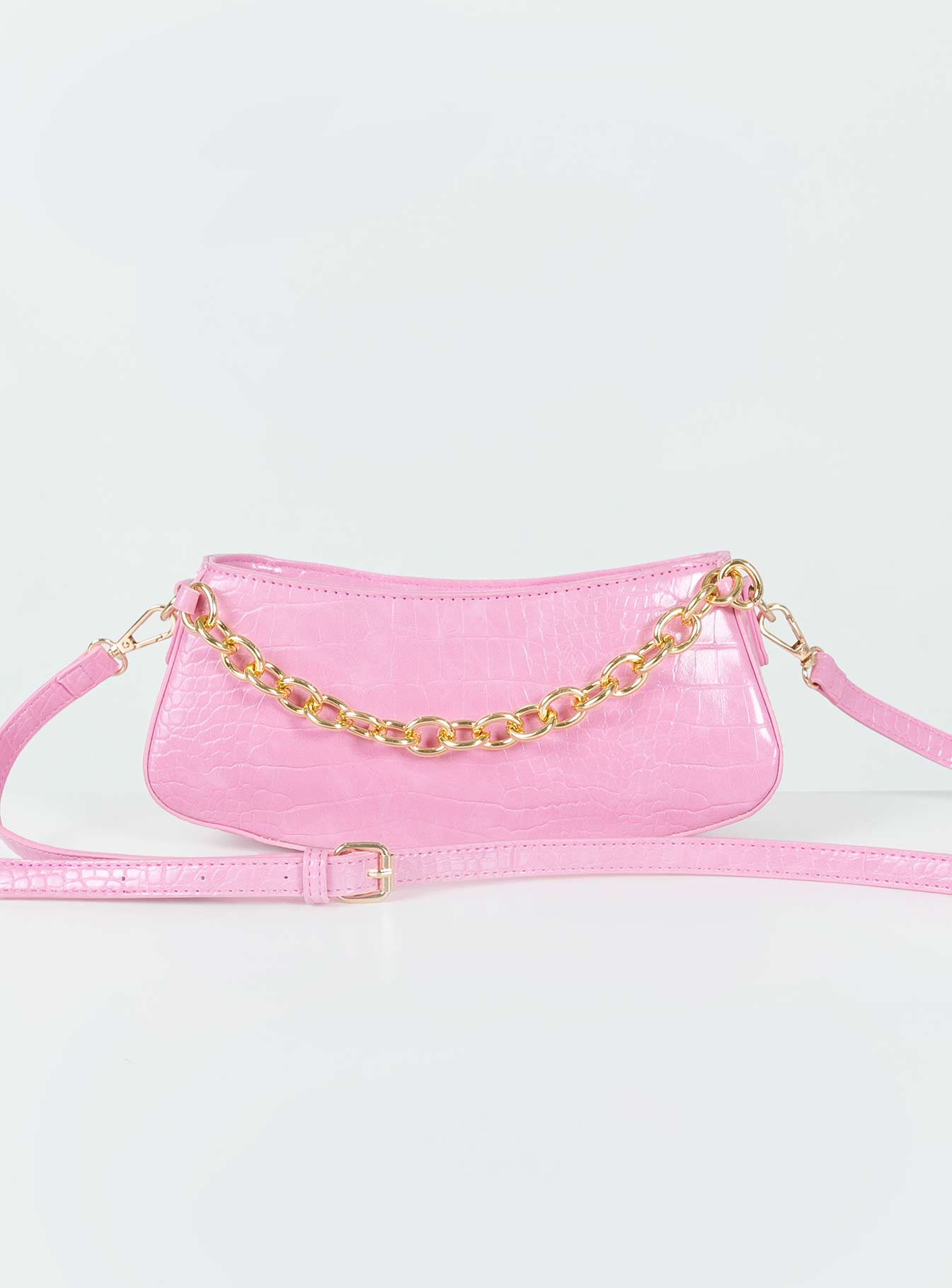 Shoulder bag Faux croc leather material  Zip fastening  Adjustable & removable crossbody strap  Fixed shoulder strap Gold-toned hardware Flat base 