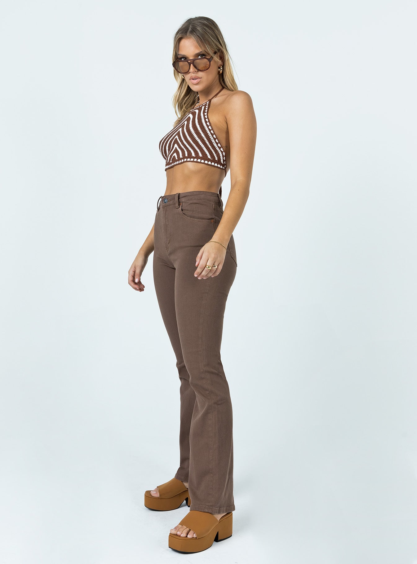 side view of model wearing Princess Polly Motel Bootleg Jeans Rich Brown High Waisted 