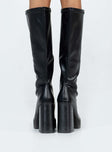 Boots Faux leather material Zip fastening at side Rounded toe Platform base Block heel