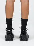 Platform shoes Faux patent leather Lace up fastening Chunky tread Padded ankle  Man made upper, lining & sole