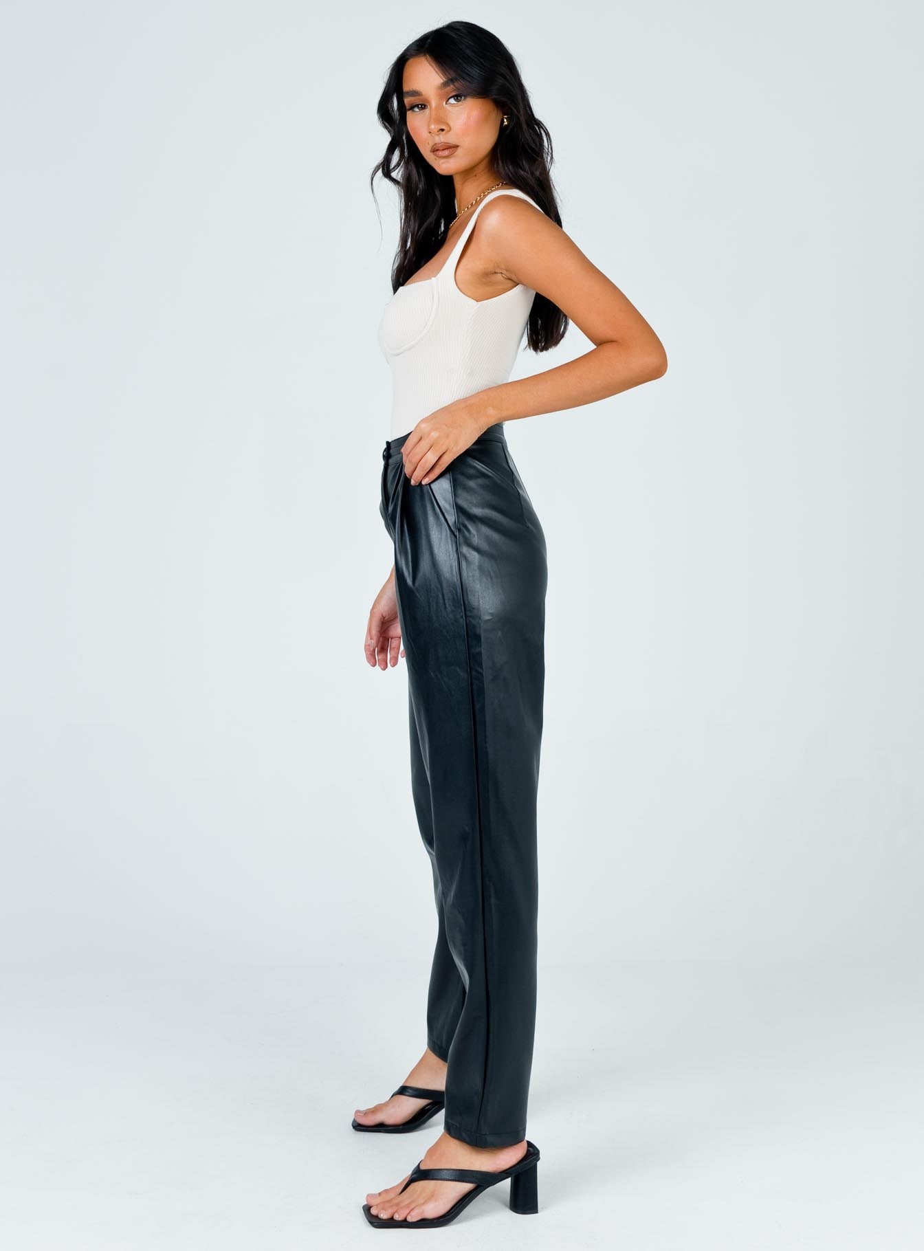 side view of model wearing Princess Polly Love Club Pants Black 