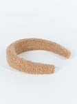 Headband  Faux fur material  Padded design  Adjustable size 