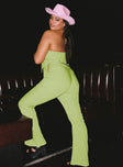 back view of model wearing Princess Polly Mid Way Laced Flare Pants Green Curve 