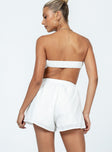 Strapless romper Linen look material  Inner silicone strip at bust  Elasticated back & waist  Exposed back 