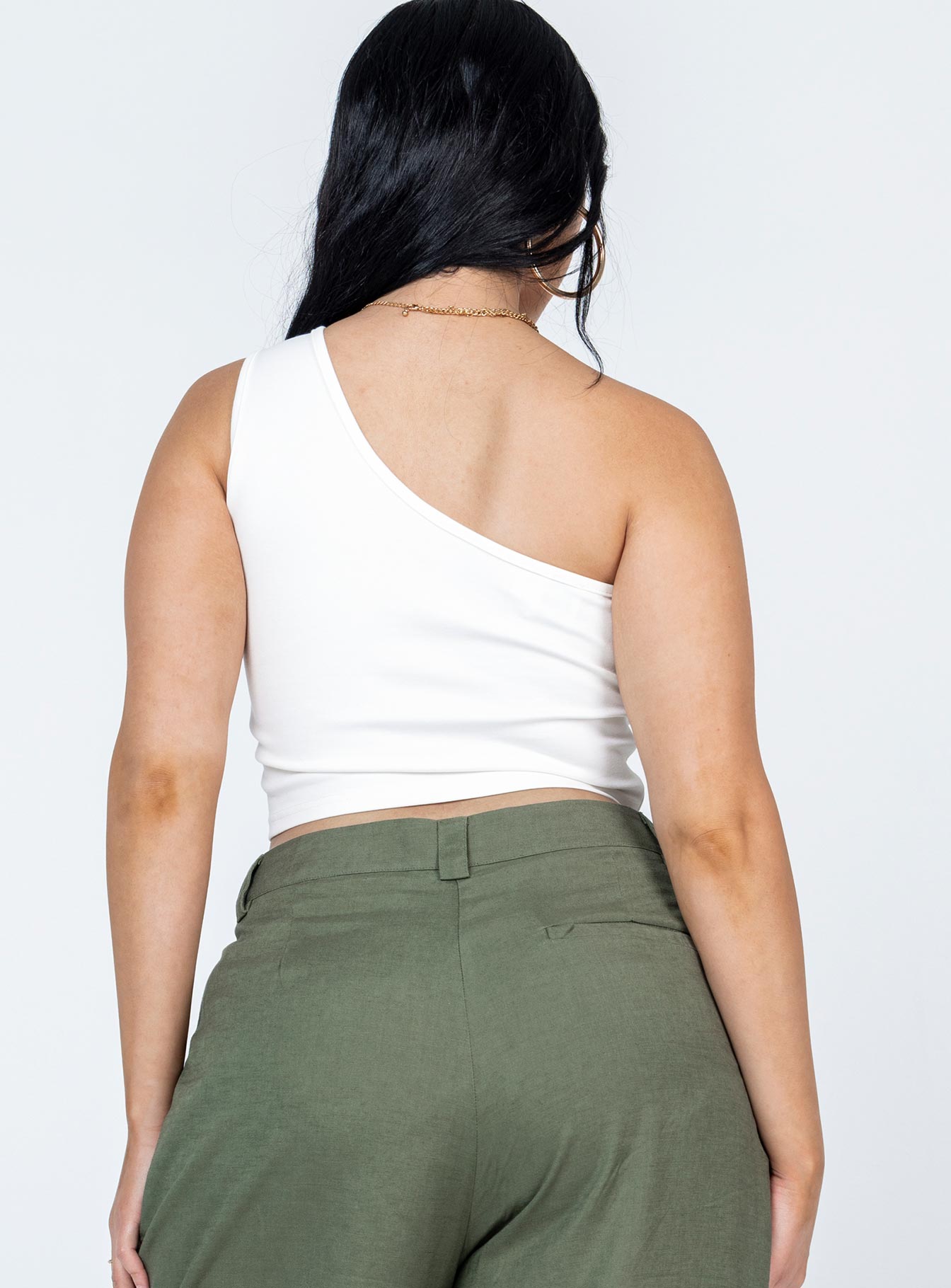 back view of model wearing Princess Polly Meranti Top White Sleeveless Asymmetric Neckline 