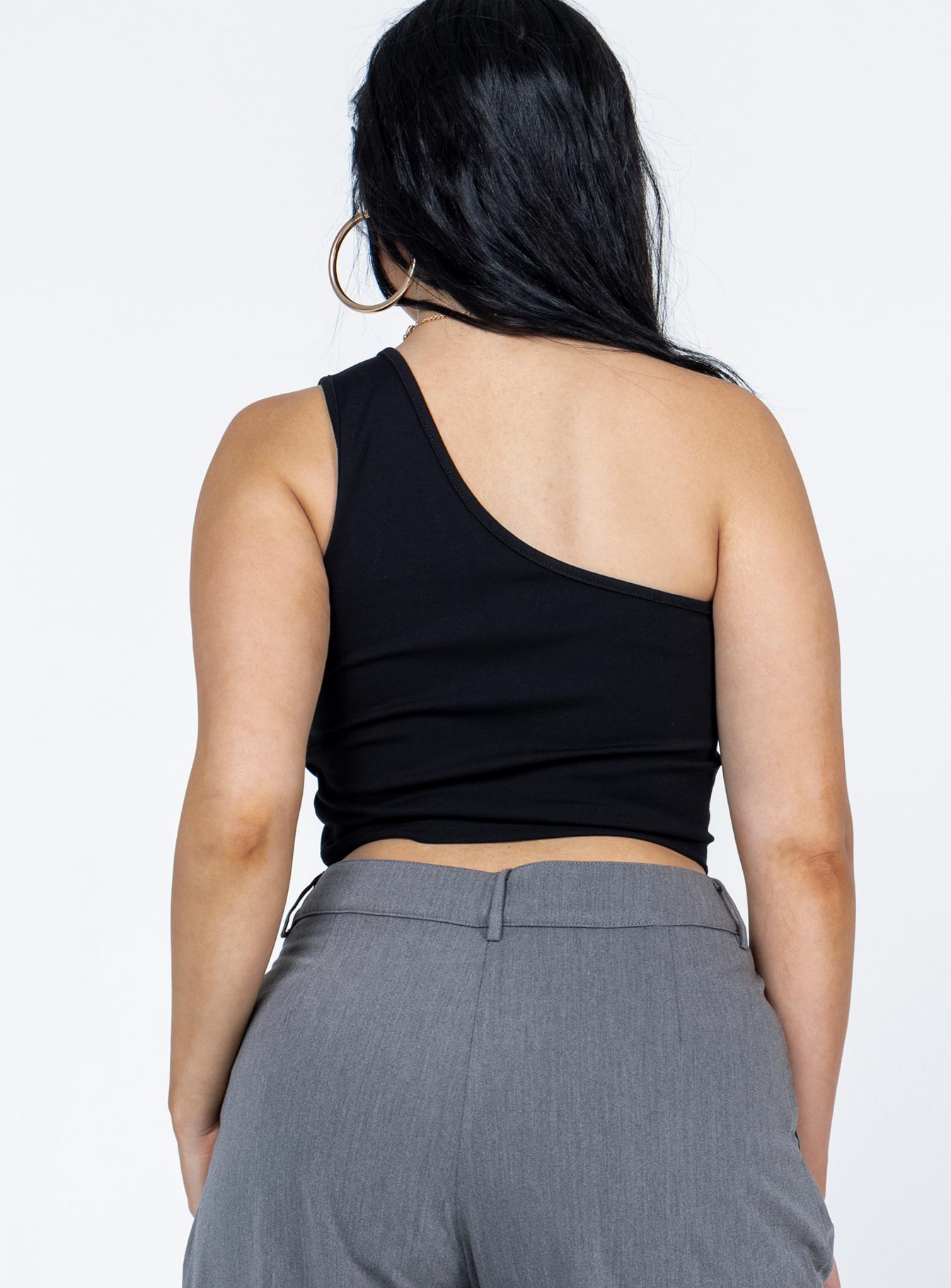 back view of model wearing Princess Polly Meranti Top Black Sleeveless Asymmetric Neckline 