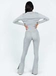 Two piece set Ribbed knit material Long sleeve top Front button fastening Flared pants Elasticated waistband Good Stretch