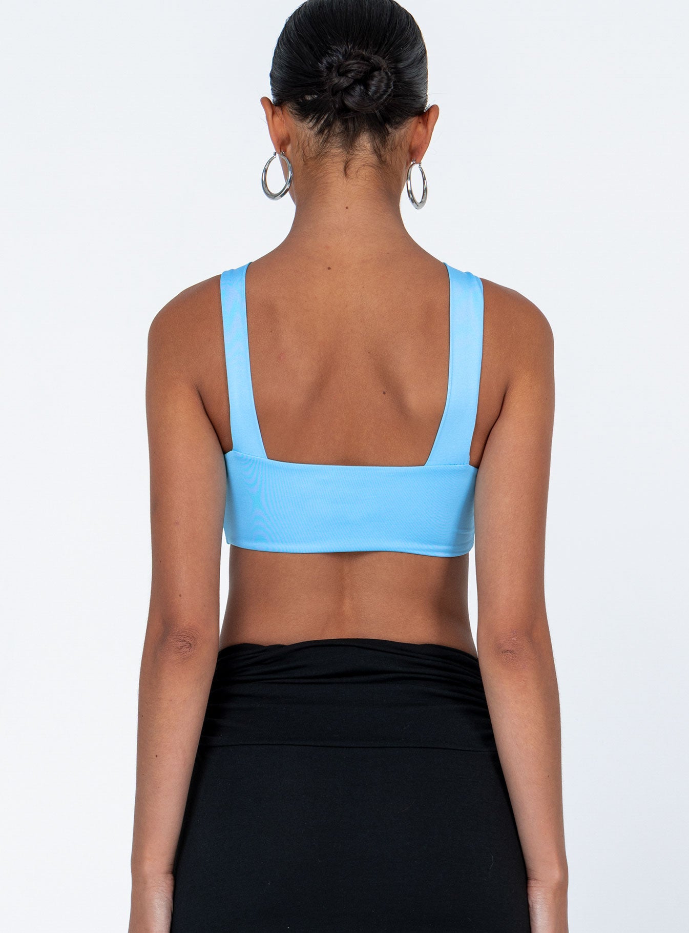 back view of model wearing Princess Polly Keoni Top Blue Sleeveless 