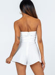 White romper Strapless design  Inner silicone strip at bust  Boning through front  Twin hip pockets  Lined top 