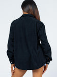 Oversized tshirt Cord material Button front fastening Scooped hem Single chest pocket