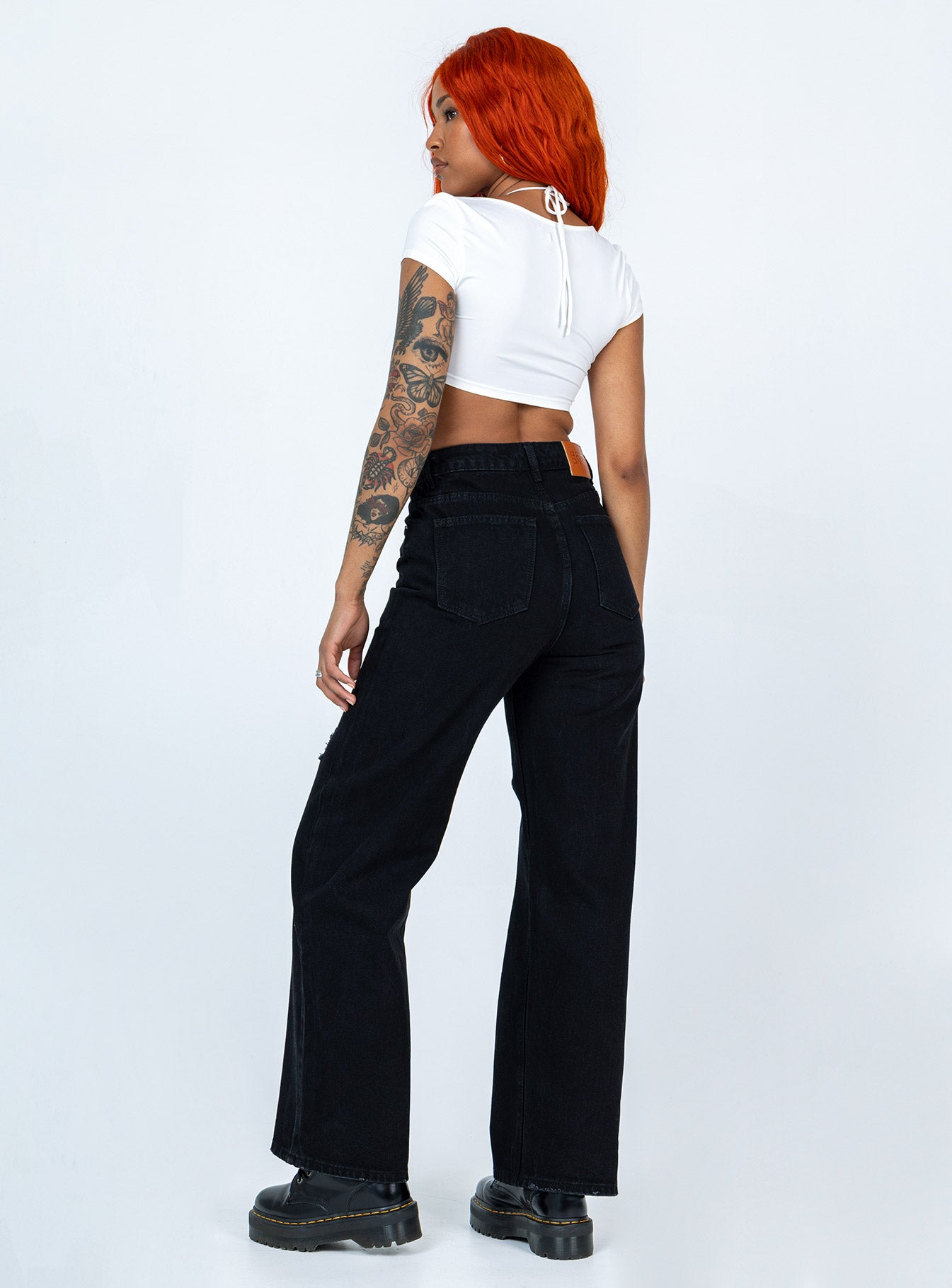 back view of model wearing Princess Polly Lugano Denim Jeans Black High Waisted 