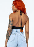 back view of model wearing Princess Polly Marlowe Bodysuit Black Sleeveless Plunger 