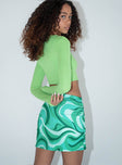 back view of model wearing Princess Polly Tuscany Mini Skirt Green 