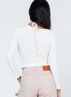 back view of model wearing Princess Polly Ramiro Long Sleeve Top White 
