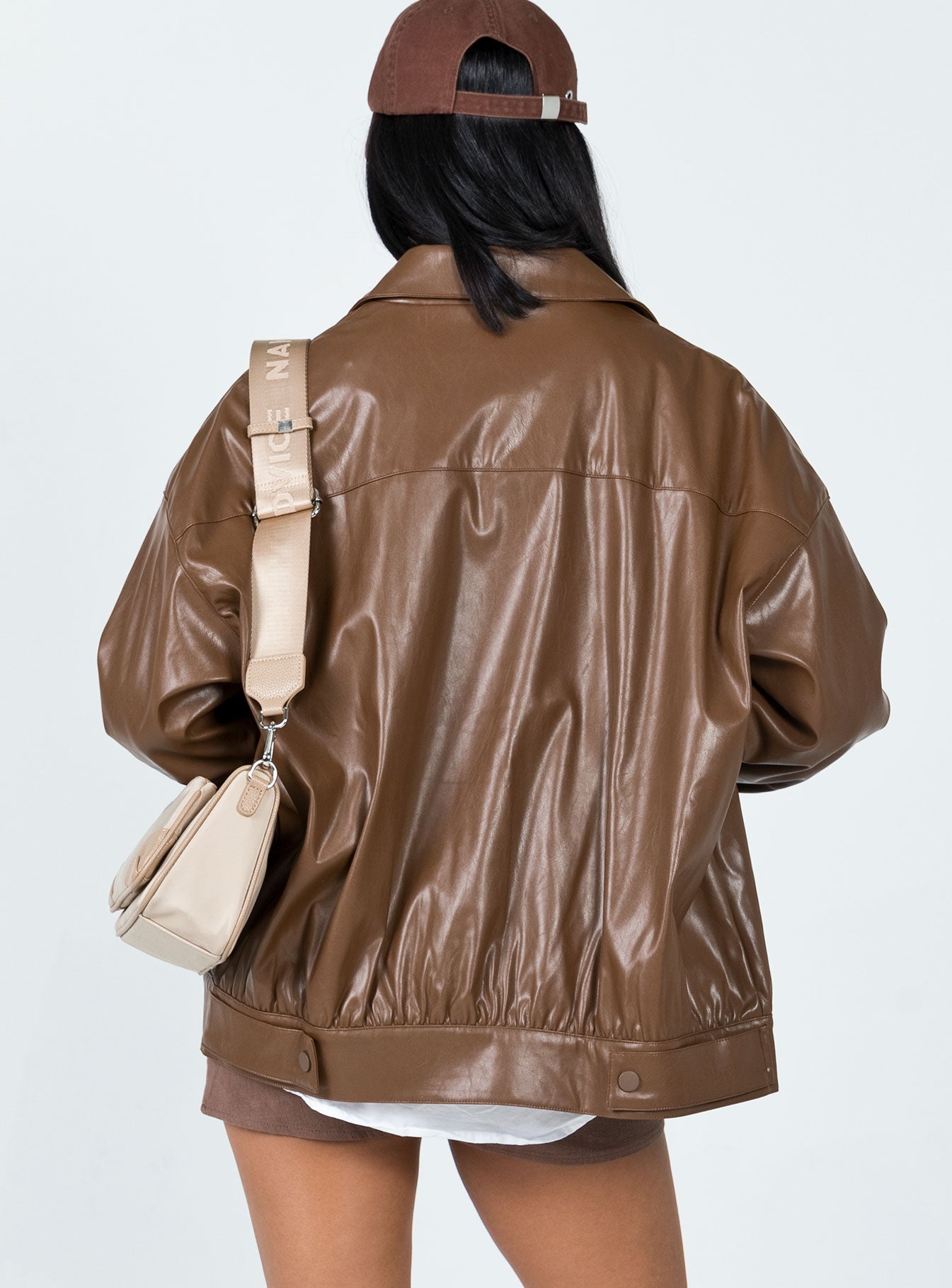 Oversized bomber jacket  Princess Polly Exclusive 50% polyester 50% PU Faux leather material  Classic collar  Press button front fastening  Single-button cuffs  Twin hip pockets  Satin lined 