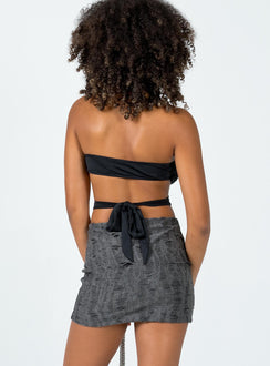 back view of model wearing Princess Polly Conan Mini Skirt Black Mini Skirts 