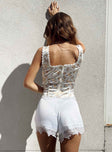 White shorts Silky material Invisible zip fastening at side Lace trim 