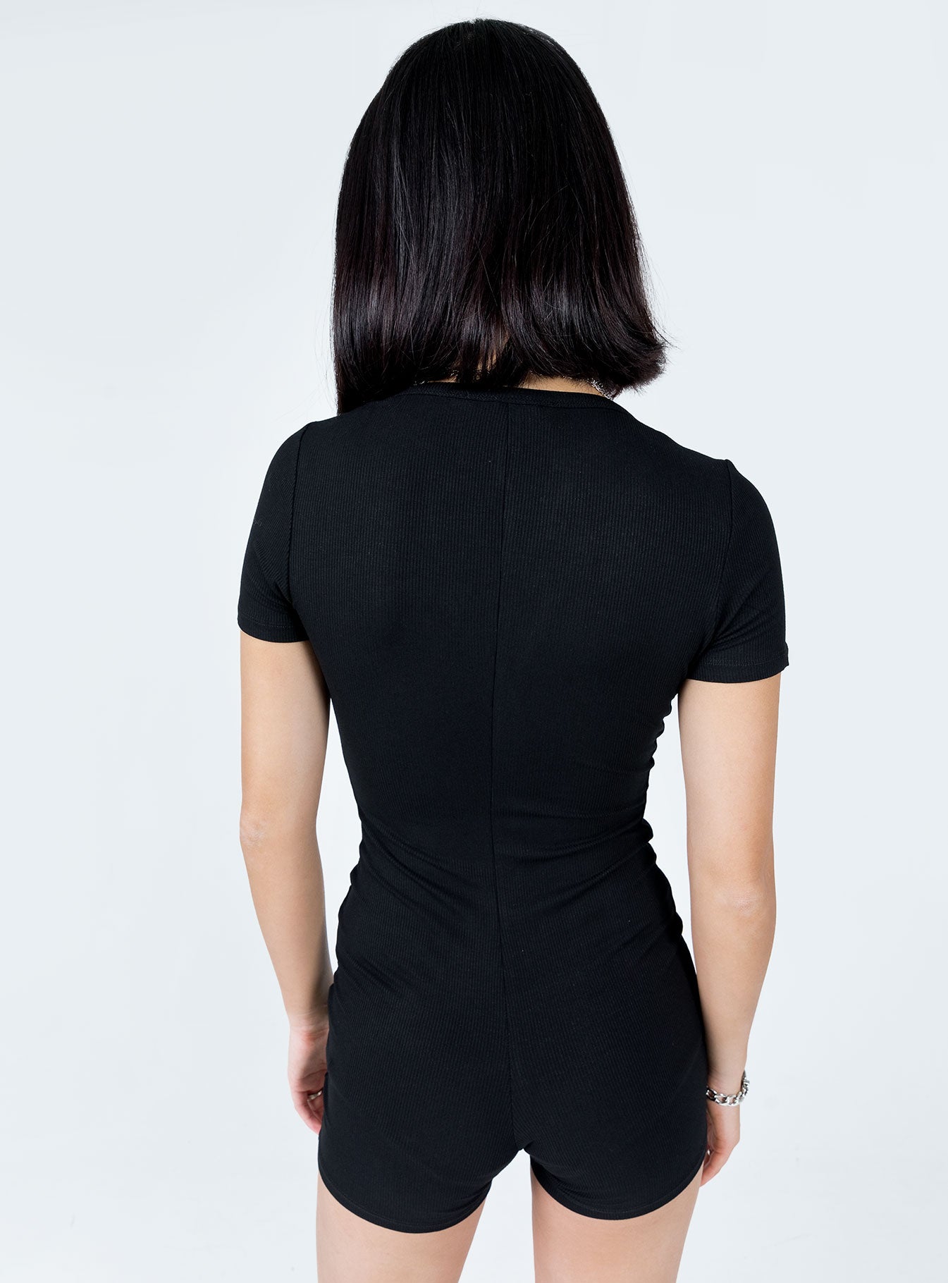 Black romper Ribbed material  Cap sleeves  Button front fastening 