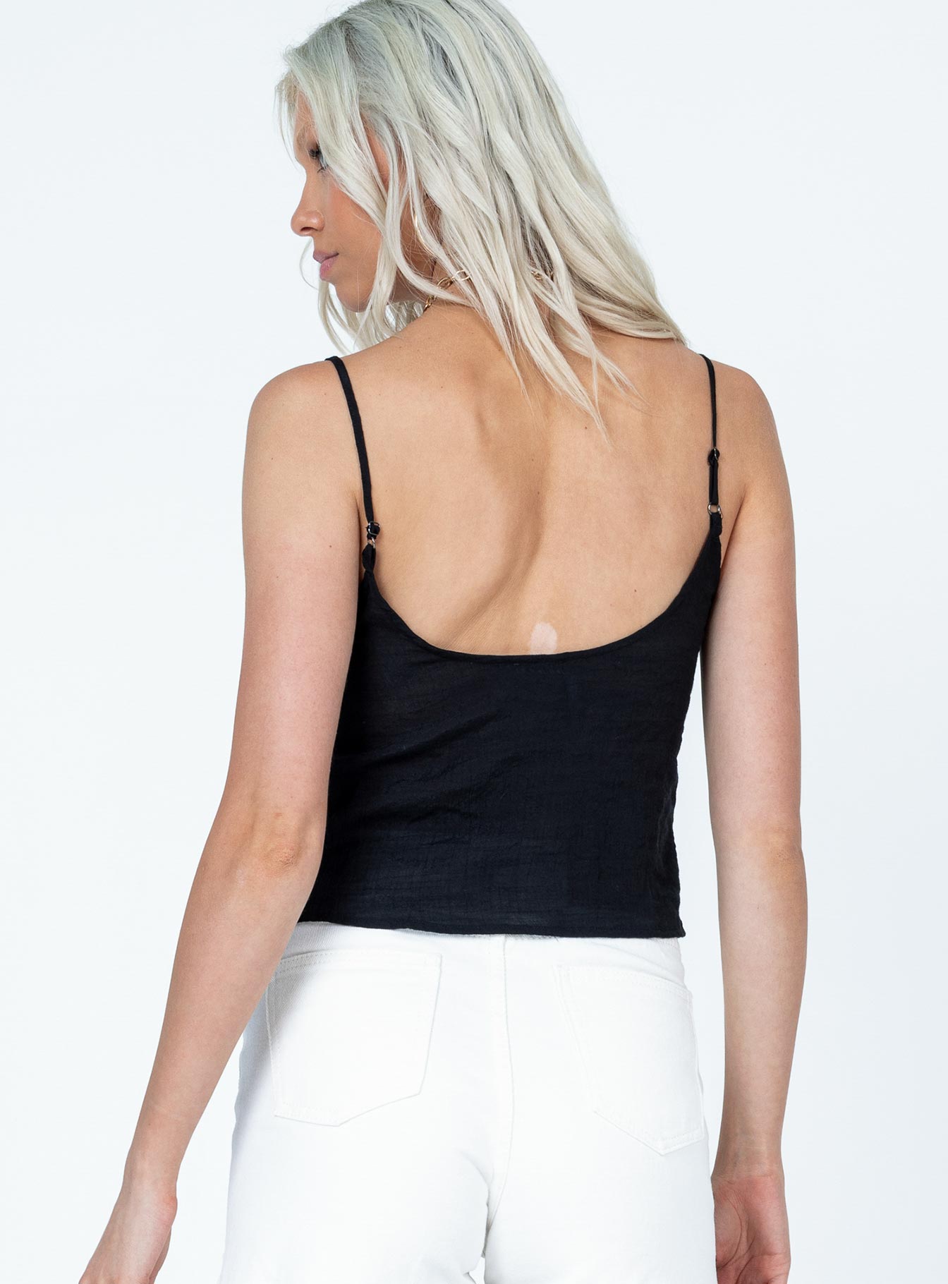 back view of model wearing Princess Polly Melita Top Black Sleeveless Scoop Neck 