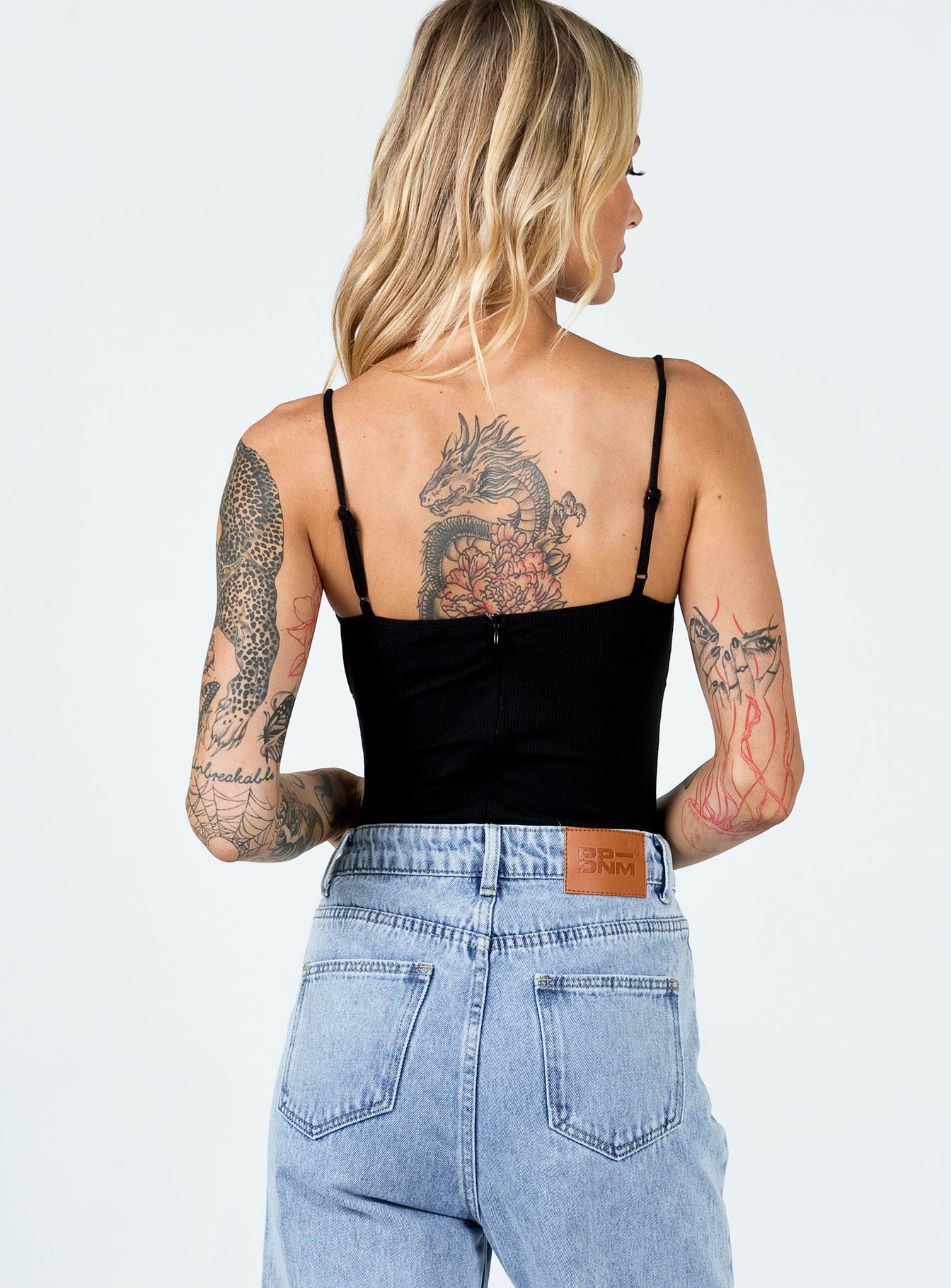 back view of model wearing Princess Polly Denver Bodysuit Black Sleeveless V-Neck 