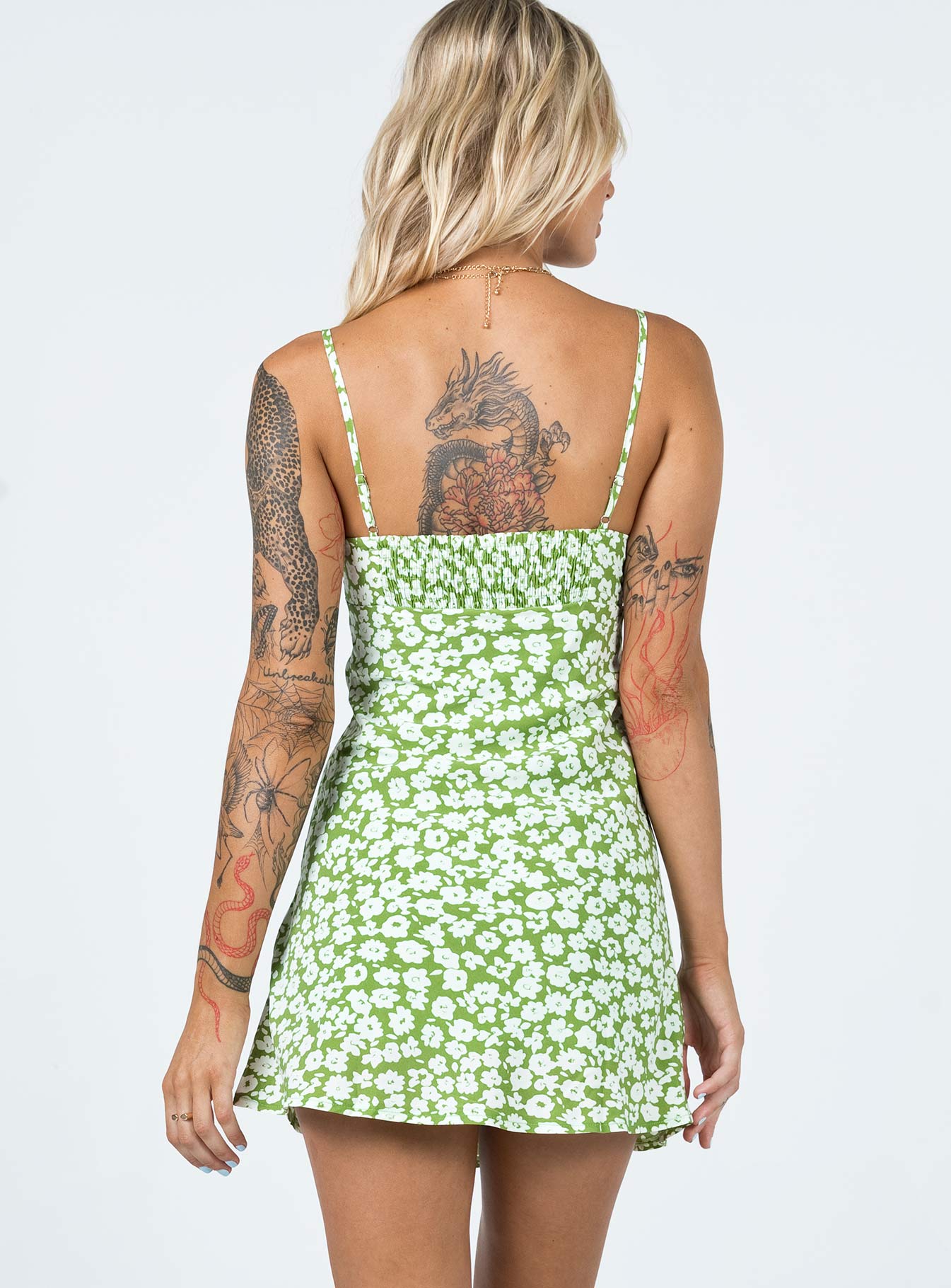 back view of model wearing Princess Polly Tasmin Mini Dress Green Floral 