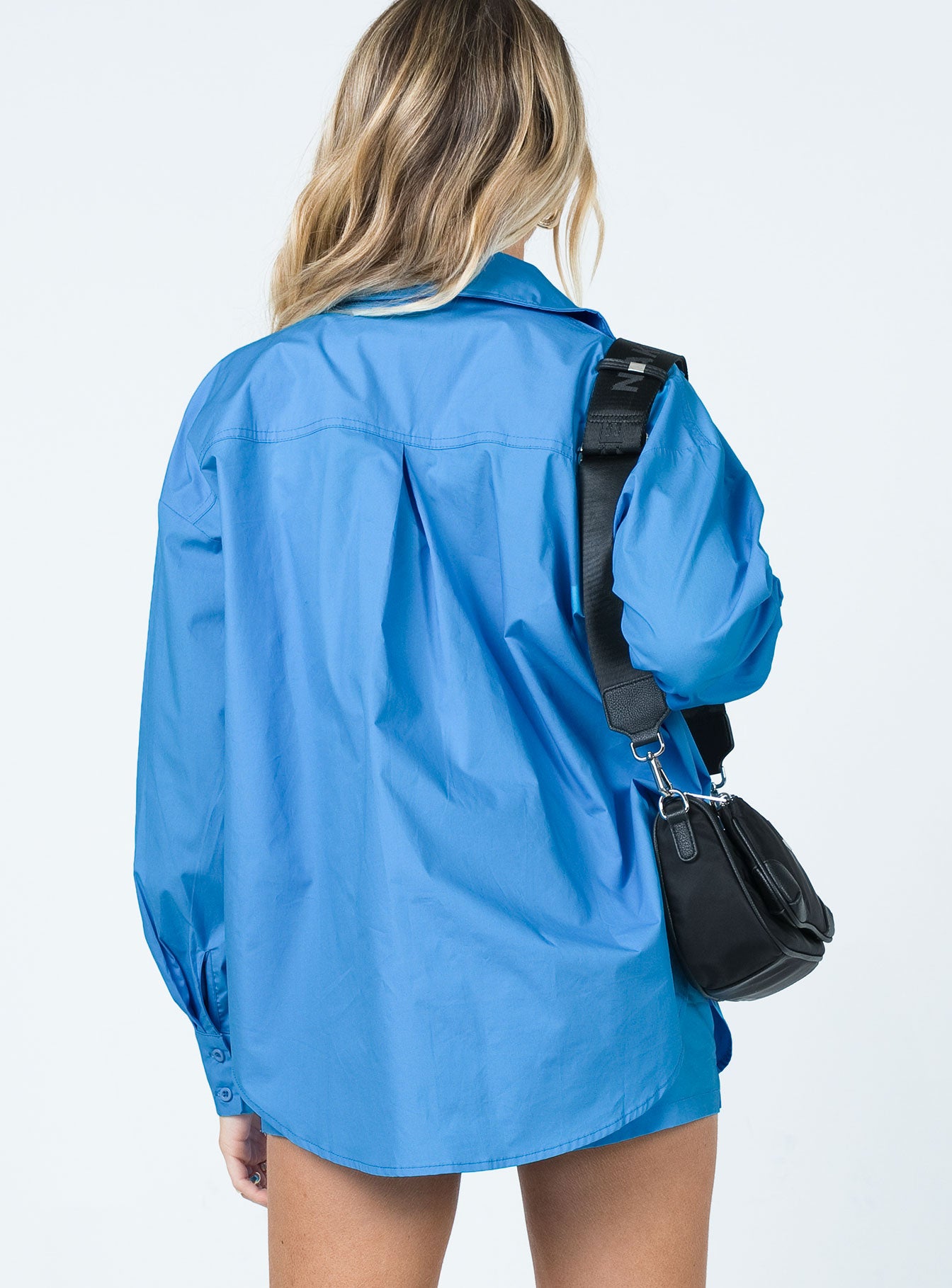 back view of model wearing Princess Polly Walsh Shirt Dark Blue 