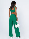 Matching set Crop top Fixed straps Invisible zip fasting at side High waisted pants Wide relaxed leg Belt loops at waist Zip & button fastening Lined top