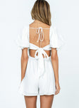 White romper Elasticated shoulders Puff sleeves  Shirred bust Double back tie fastening  Low back 