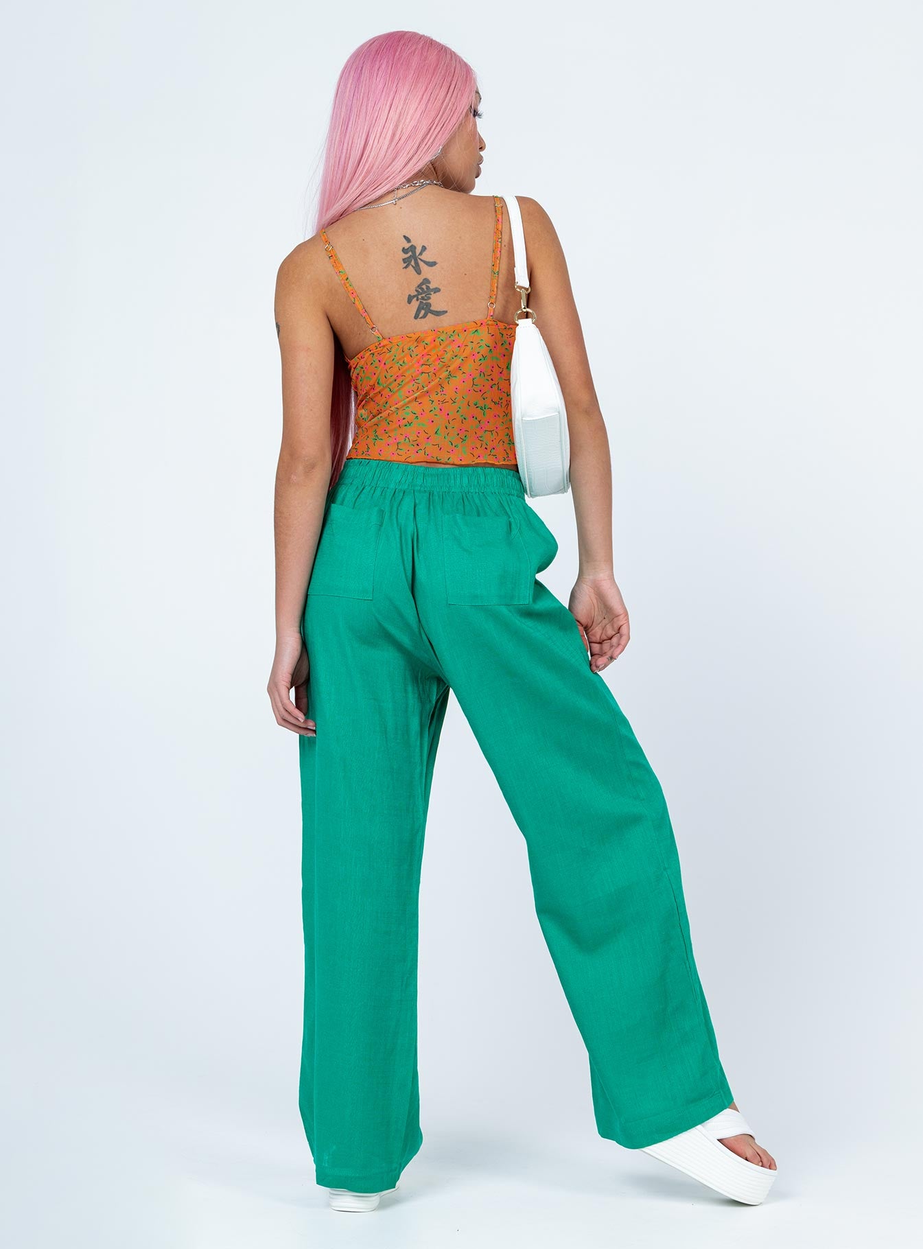 back view of model wearing Princess Polly Louis Linen Blend Pants Green 
