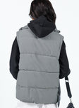 Oversized puffer vest High neck Front zip fastening Twin hip pockets Adjustable drawstring hem