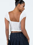 Crop top Sheer textured material Elasticated shoulders Tie front fastenings Non-stretch  Partially lined 