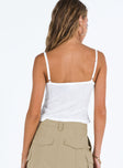 White crop top Pointelle material Adjustable shoulder straps Sweetheart neckline