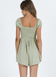 Green romper Cap sleeve Ruched bust Tie detail Shirred back band Invisible zip fastening at side Boning through front Ruched waist