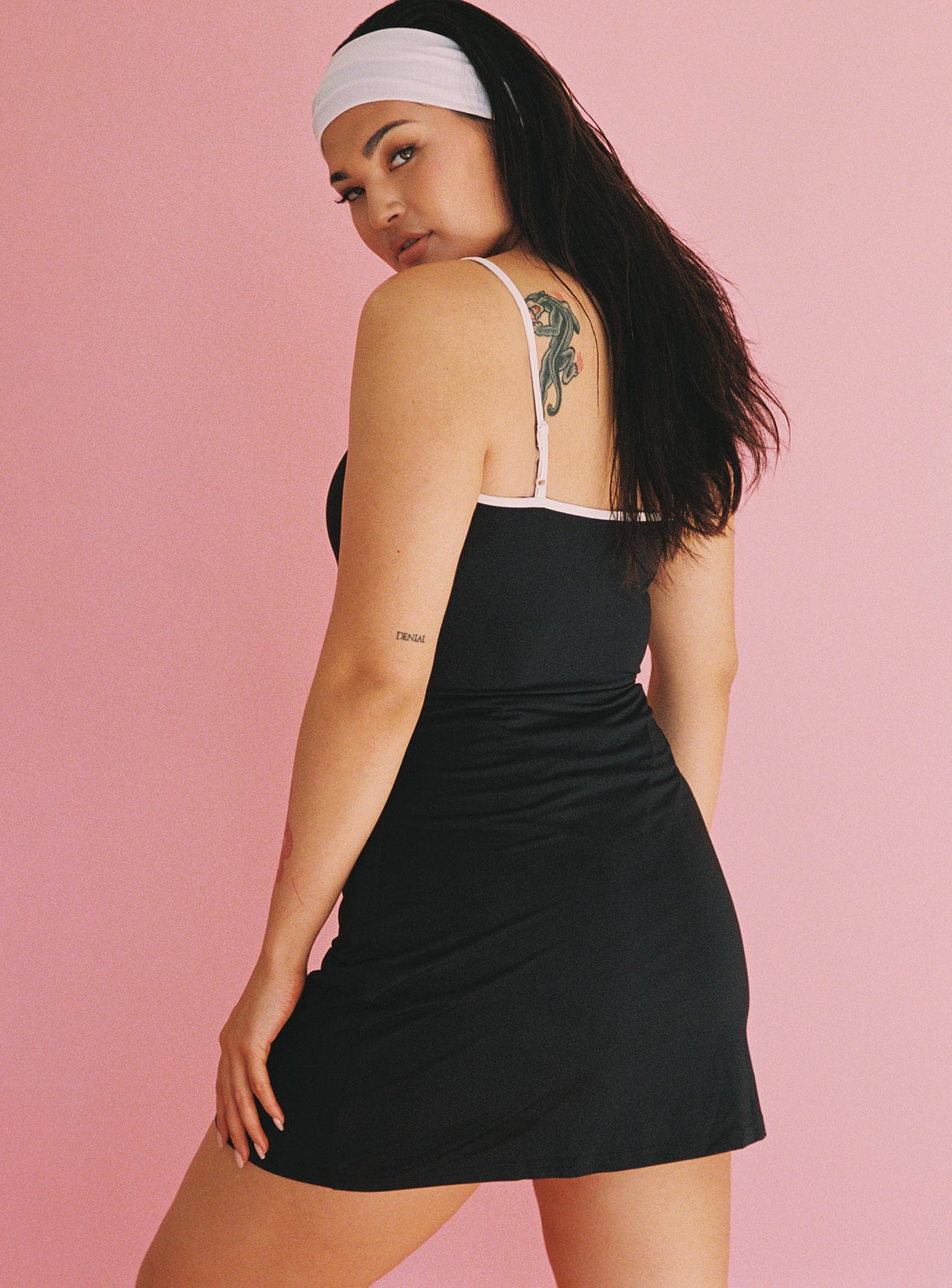 side view of model wearing Princess Polly Track Star Mini Dress Black 