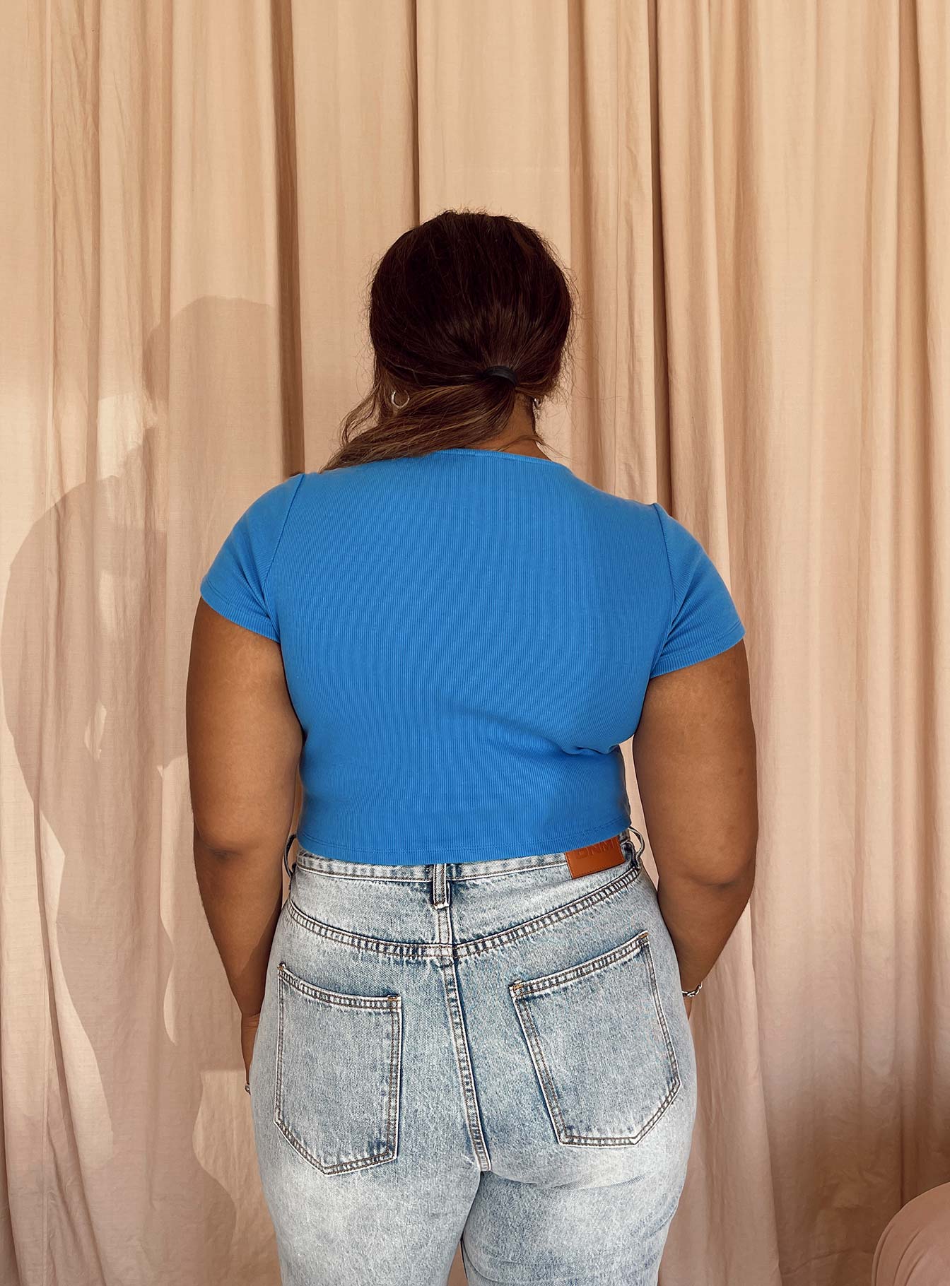 back view of model wearing Princess Polly Classic Crop Tee Blue Curve Short Sleeves Crew Neck 