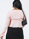 Long sleeve top Wide square neckline Tie fastening at bust Open front design Frill hem