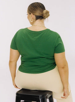 back view of model wearing Princess Polly Organic Protect Charity Baby Tee Green Curve Short Sleeves Crew Neck 
