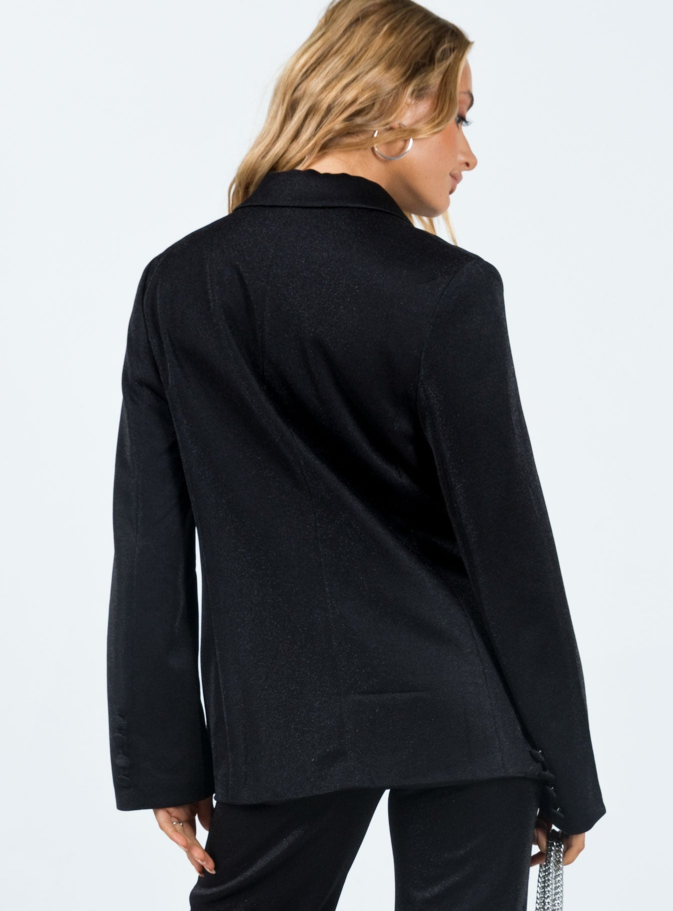 Blazer Glittery material Lapen collar Twin front pockets Button detail at cuff