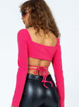 Pink long sleeve top slim fitting Ribbed material Elasticated shoulders Keyhole cut out at bust Waist tie fastening