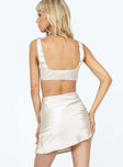 Matching set Crop top  Tie fastening at bust  High waisted mini skirt  Invisible zip fastening at side  Side slit 