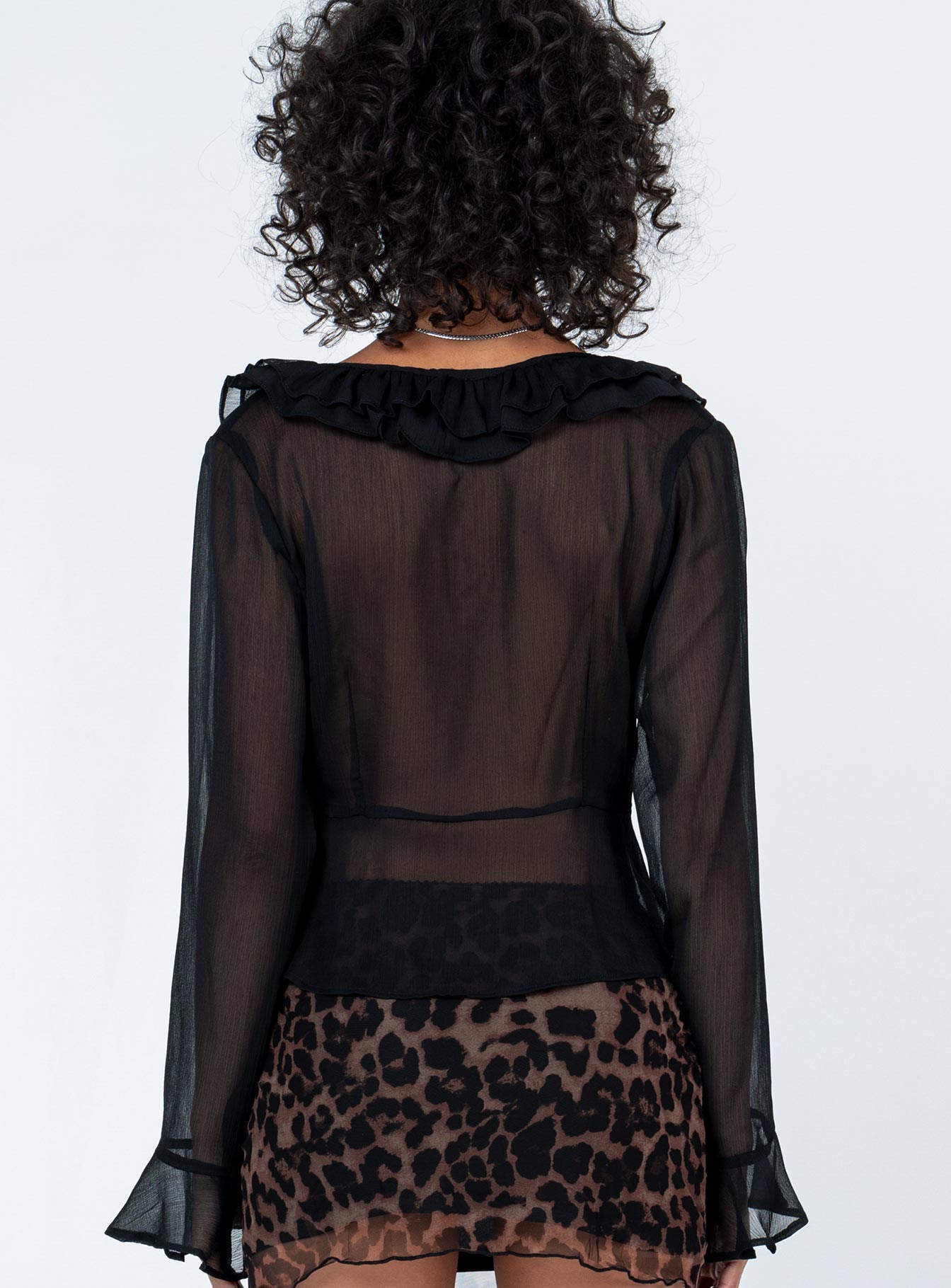 back view of model wearing Princess Polly Colby Long Sleeve Top Black Full Sleeves V-Neck 