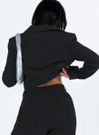 Black cropped blazer Ribbed material Lapel collar Single button fastening at front Chest pocket Padded shoulders