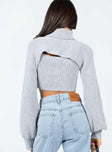 Sweater  Two-piece set These items can be worn separately  Slim fitting  50% viscose 30% polyester 20% nylon  Knit material  Long sleeve bolero  Turtle neck  Crop tank top 