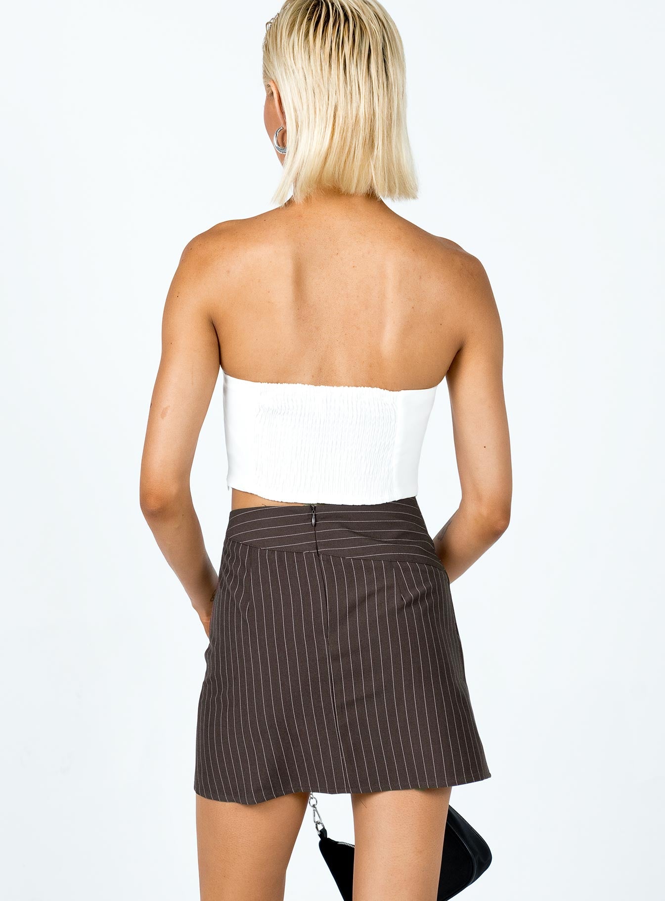 back view of model wearing Princess Polly Neo Pinstripe Mini Skirt Brown 