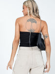 back view of model wearing Princess Polly Davina Top Black Sleeveless Sweetheart 